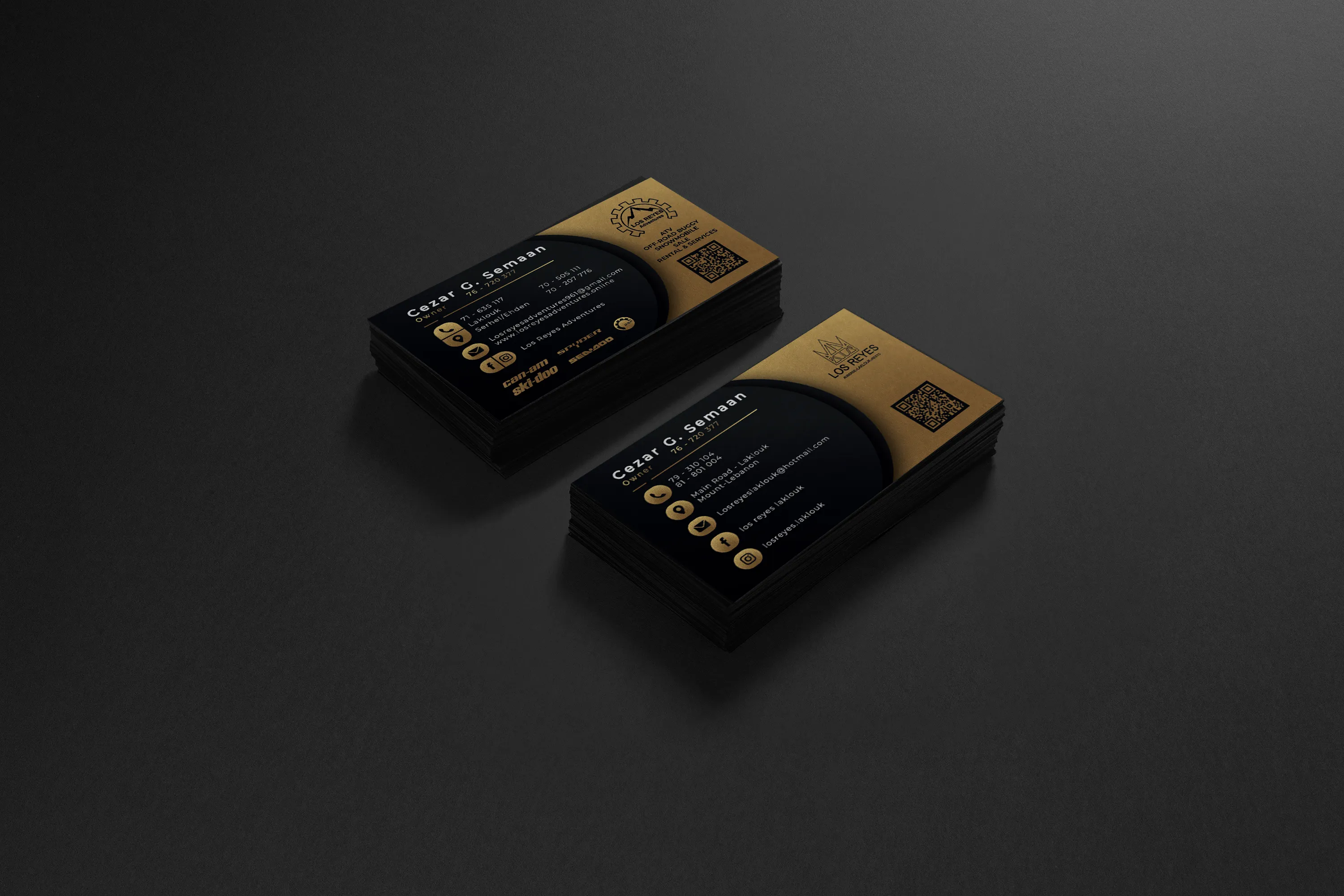 Finished business cards, printed in black and gold