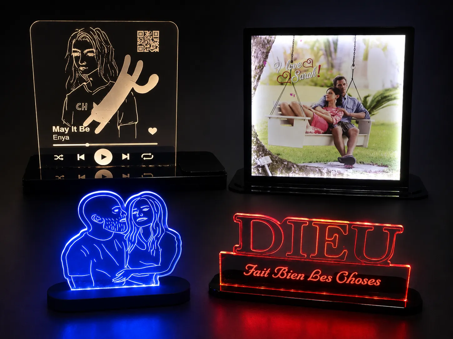 Edge-lit acrylic pieces, engraved and mounted on lit bases